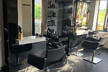Het Huys Van De Kapper